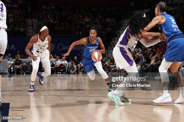 Alyssa Thomas of the Connecticut Sun dribbles the ball during the game against the Los Angeles Sparks on August 27, 2023 at the Mohegan Sun Arena in...