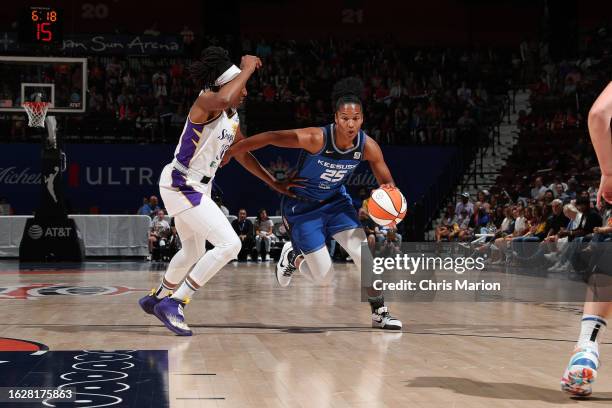 Alyssa Thomas of the Connecticut Sun dribbles the ball during the game against the Los Angeles Sparks on August 27, 2023 at the Mohegan Sun Arena in...