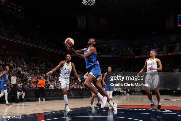 Tiffany Hayes of the Connecticut Sun drives to the basket during the game against the Los Angeles Sparks on August 27, 2023 at the Mohegan Sun Arena...