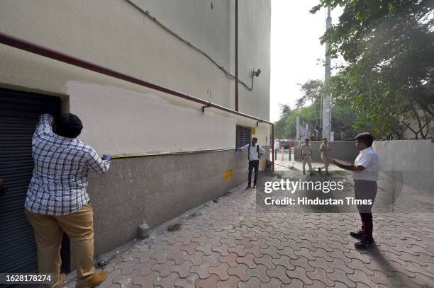 Forensic experts team investigating the site of pro-Khalistan slogans written on the wall at Paschim Vihar West Metro Station, on August 27, 2023 in...