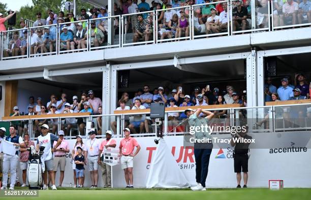 Xander Schauffele of the United States plays his shot from the first tee during the final round of the TOUR Championship at East Lake Golf Club on...