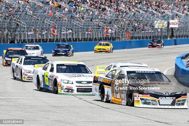 Sean Hingorani driving the GEARWRENCH Toyota leads a group through turn one during the Menards ARCA Series Sprecher 150 on August 27, 2023 at the...