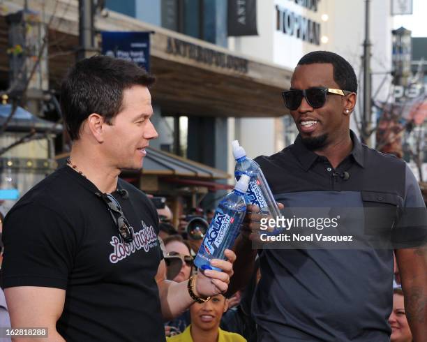 Mark Wahlberg and Sean Combs visit Extra at The Grove on February 27, 2013 in Los Angeles, California.