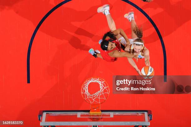 Kristy Wallace of the Indiana Fever drives to the basket during the game against the Atlanta Dream on August 27, 2023 at Gainbridge Fieldhouse in...