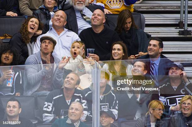 Dax Shepard, Kristen Bell, Alyssa Milano and David Bugliari attend a hockey game between the Detroit Red Wings and Los Angeles Kings at Staples...