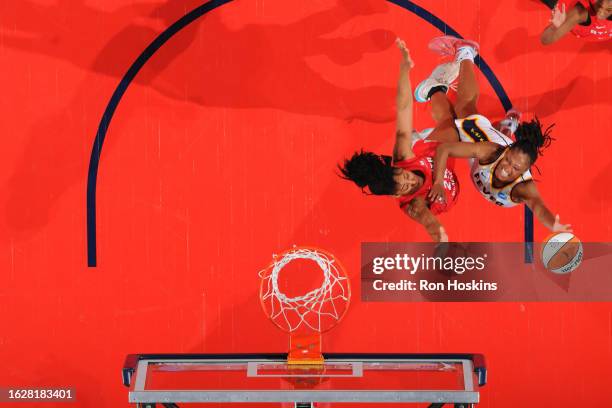 Kelsey Mitchell of the Indiana Fever drives to the basket during the game against the Atlanta Dream on August 27, 2023 at Gainbridge Fieldhouse in...