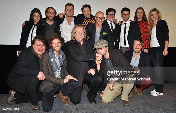 Director Hans Hofer, producer Danny Krausz and the filmcrew pose on stage during the after party for the premiere of 'Zweisitzrakete' at Technisches...