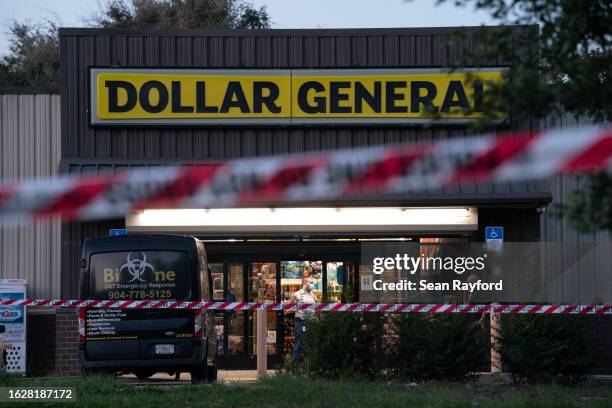 Biohazard cleanup vehicle is parked outside the Dollar General store where three people were shot and killed the day before on August 27, 2023 in...