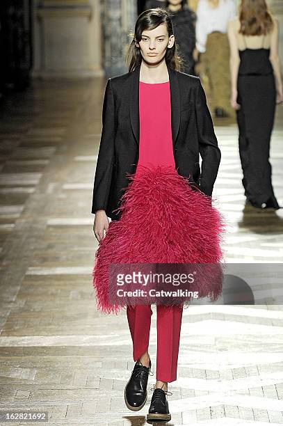 Model walks the runway at the Dries van Noten Autumn Winter 2013 fashion show during Paris Fashion Week on February 27, 2013 in Paris, France.