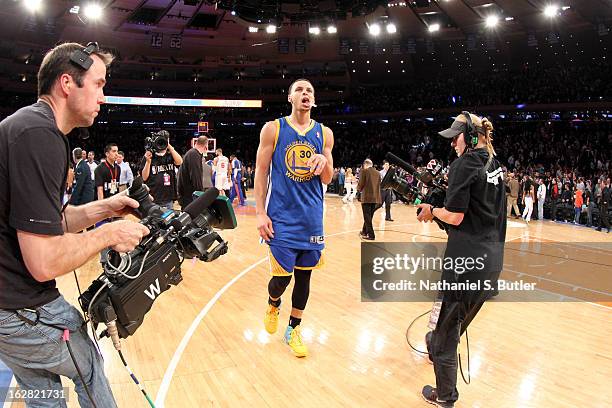 Stephen Curry of the Golden State Warriors walks off the court after his team's loss against the New York Knicks, a game in which he scored a career...