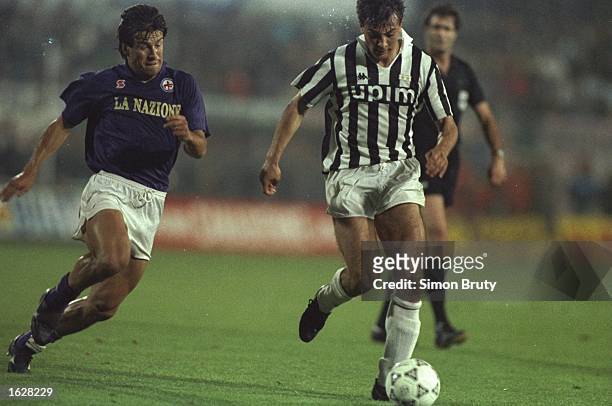 Gianluigi Casiraghi of Juventus is put under pressure by Dunga of Fiorentina during the UEFA Cup Final second leg match in Avellino, Italy. The match...