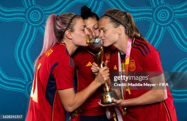 Alexia Putellas, Jennifer Hermoso and Irene Paredes of Spain pose with the FIFA Women's World Cup Australia & New Zealand 2023 trophy after victory...