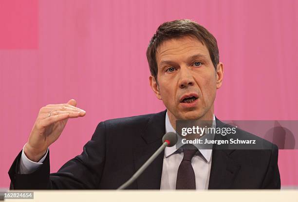 Deutsche Telekom AG chief executive officer Rene Obermann adresses the company's annual press conference to announce financial results for 2012 on...