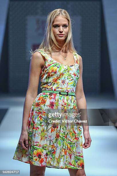 Top model Erin Heatherton walks the runway during the Liverpool Fashion Fest Spring/Summer 2013 fashion show at Liverpool Centro Comercial...