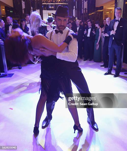 Dancers perform at the grand opening of the Waldorf Astoria Berlin hotel on February 27, 2013 in Berlin, Germany.