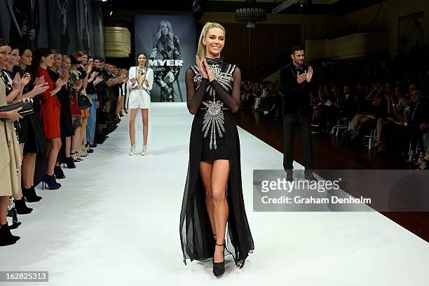 Model Jennifer Hawkins showcases designs by Sass & Bide at the Myer Autumn/Winter 2013 collections launch at Mural Hall at Myer on February 28, 2013...