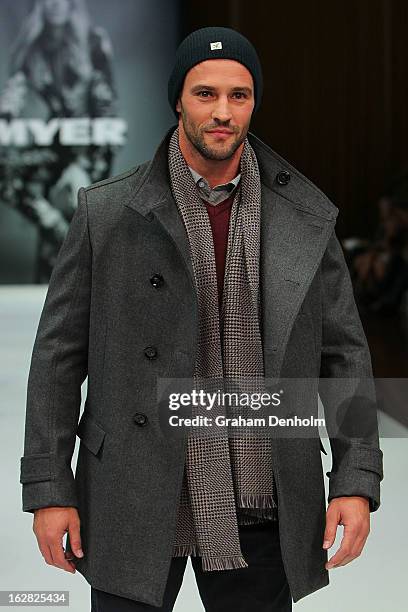 Model Kris Smith showcases designs by R&G at the Myer Autumn/Winter 2013 collections launch at Mural Hall at Myer on February 28, 2013 in Melbourne,...