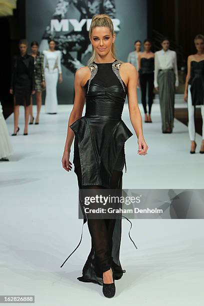 Model Jennifer Hawkins showcases designs by Toni Maticevski at the Myer Autumn/Winter 2013 collections launch at Mural Hall at Myer on February 28,...