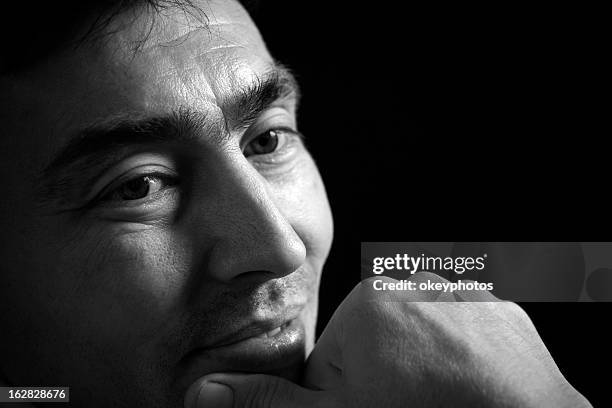 portrait of a kazakistan man - kazakhstan man stock pictures, royalty-free photos & images