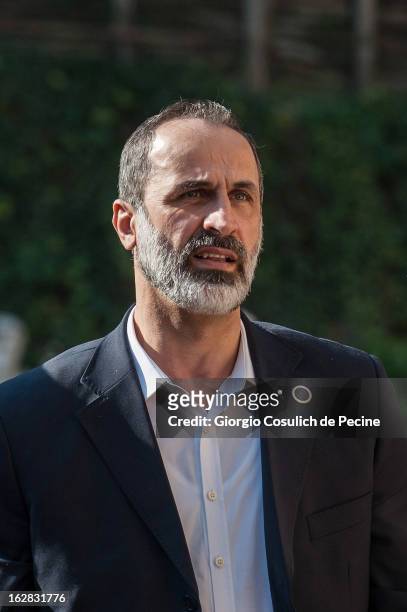 Syrian opposition's National Coalition chief Ahmed Moaz al-Khatib arrives to attend a meeting of the 'Friends of the Syrian People' attended by US...