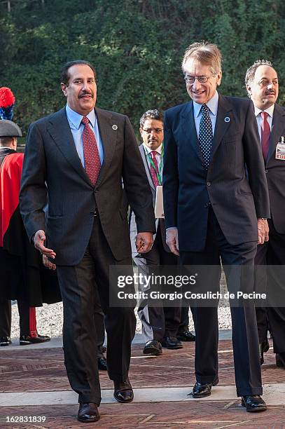Qatari Prime Minister Sheikh Hamad bin Jassim al-Thani and Italian Foreign Minister Giulio Terzi arrive to attend a meeting of the 'Friends of the...