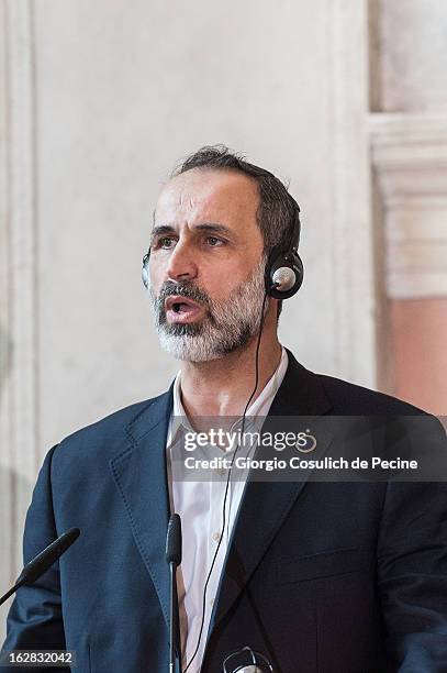 Syrian opposition's National Coalition chief Ahmed Moaz al-Khatib speaks during a press conference after the meeting of the 'Friends of the Syrian...