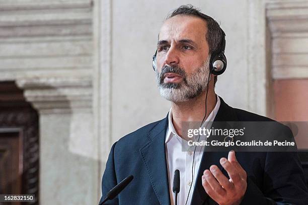 Syrian opposition's National Coalition chief Ahmed Moaz al-Khatib speaks during a press conference after the meeting of the 'Friends of the Syrian...