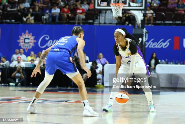 Los Angeles Sparks guard Jordin Canada and Connecticut Sun guard Natisha Hiedeman during a WNBA game between Los Angeles Sparks and Connecticut Sun...