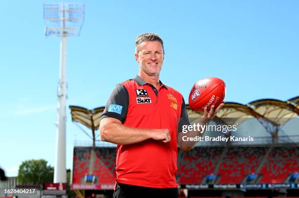 Damien Hardwick poses for a photo after a Gold Coast Suns AFL press conference announcing the signing of their new coach at Heritage Stadium on...