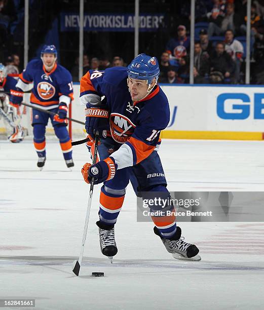 Marty Reasoner of the New York Islanders skates against the Carolina Hurricanes at the Nassau Veterans Memorial Coliseum on February 24, 2013 in...