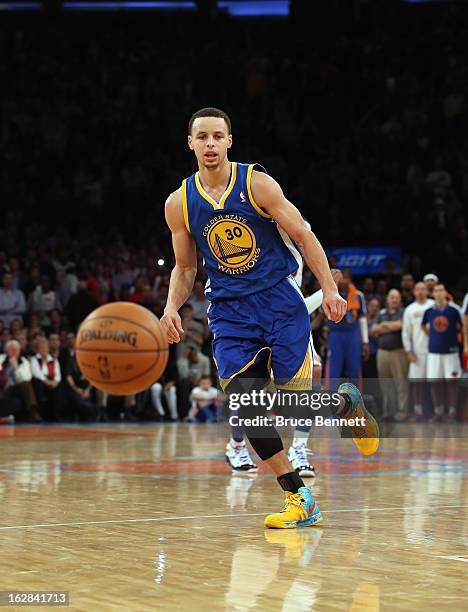 Stephen Curry of the Golden State Warriors dribbles against the New York Knicks at Madison Square Garden on February 27, 2013 in New York City. NOTE...