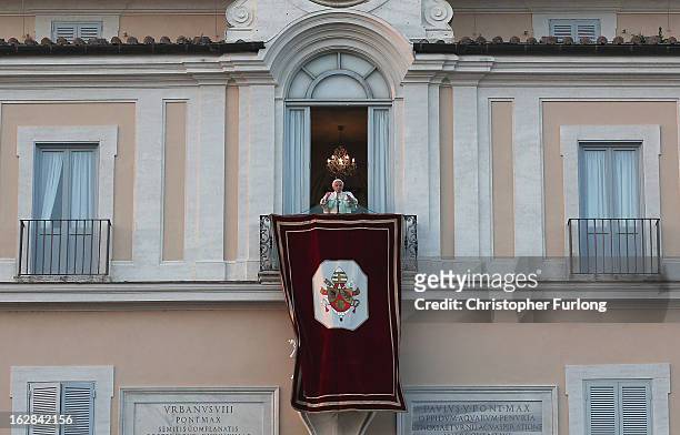 Pope Benedict XVI waves to pilgrims, for the last time as head of the Catholic Church, from the window of Castel Gandolfo where he will start his...