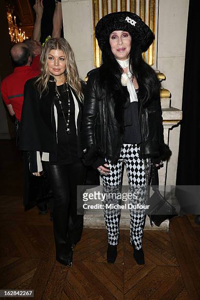 Fergie and Cher attend the Balmain Fall/Winter 2013 Ready-to-Wear show as part of Paris Fashion Week on February 28, 2013 in Paris, France.