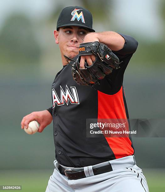 Miami Marlins pitcher Jose Fernandez throws a pitch in the second inning of the spring training game B with the St. Louis Cardinals at Roger Dean...