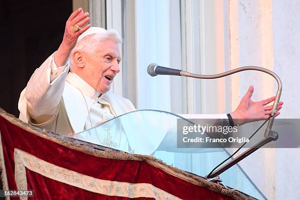 Pope Benedict XVI waves to pilgrims, for the last time as head of the Catholic Church, from the window of Castel Gandolfo where he will start his...