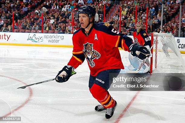 Brian Campbell of the Florida Panthers skates for poession against the Pittsburgh Penguins at the BB&T Center on February 26, 2013 in Sunrise,...