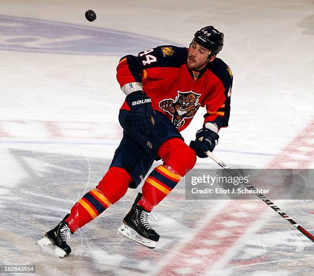 Erik Gudbranson of the Florida Panthers skates for possession against the Pittsburgh Penguins at the BB&T Center on February 26, 2013 in Sunrise,...