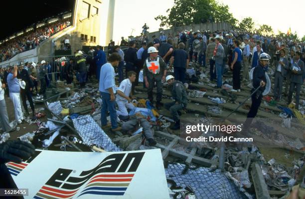 The aftermath of the crowd riots during the European Cup Final between Juventus and Liverpool at the Heysel Stadium in Brussels, Belgium. Juventus...