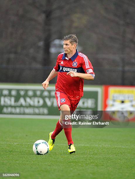 Logan Pause of the Chicago Fire looks to pass against the Vancouver Whitecaps FC during the first half of the Carolina Challenge Cup at Blackbaud...