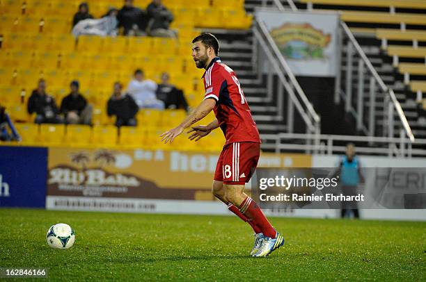 Steven Kinney of the Chicago Fire looks to pass against the Vancouver Whitecaps FC during the second half of the Carolina Challenge Cup at Blackbaud...