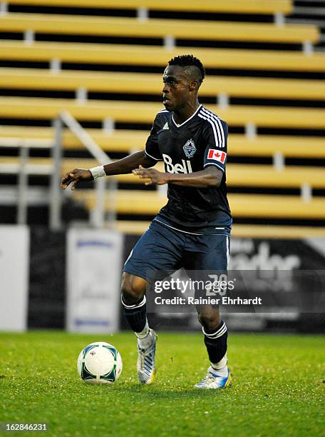 Gershon Koffie of the Vancouver Whitecaps FC looks to pass against the Chicago Fire during the first half of the Carolina Challenge Cup at Blackbaud...