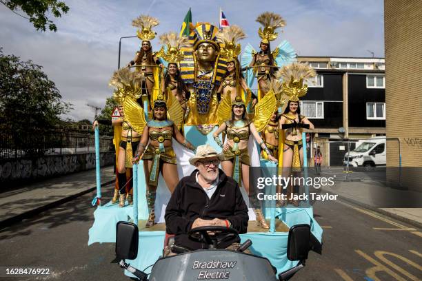 Performers on a float prepare to join a parade on the final day of Notting Hill Carnival on August 28, 2023 in London, England. The annual Caribbean...