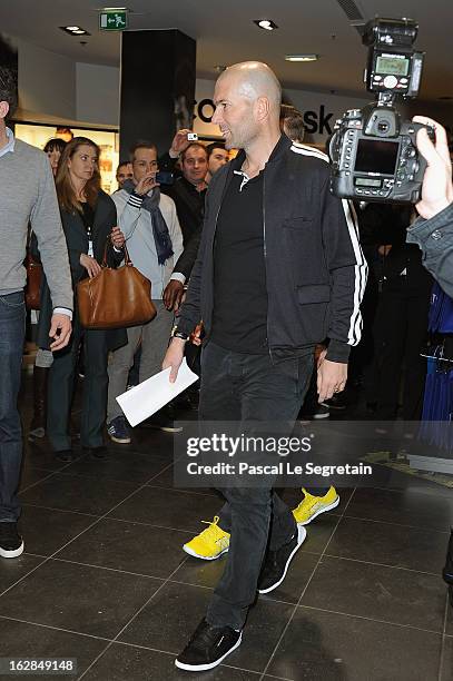 Zinedine Zidane arrives to attend an autograph session at adidas Performance Store Champs-Elysees on February 28, 2013 in Paris, France.