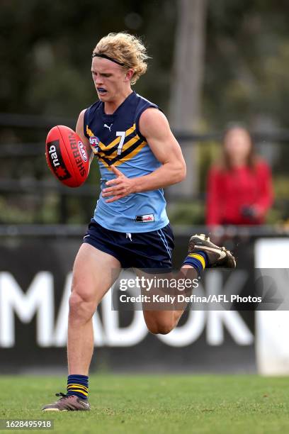 Joe Harrison of NSW/ACT runs with the ball during the AFL U17 Futures Boys match between Vic Metro and NSW/ACT at Avalon Airport Oval on August 13,...
