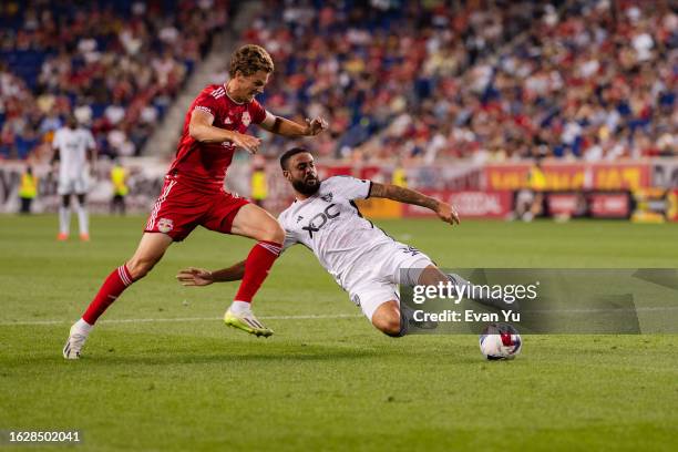 Derrick Williams of D.C. United makes a tackle during the first half against the New York Red Bulls at Red Bull Arena on August 20, 2023 in Harrison,...