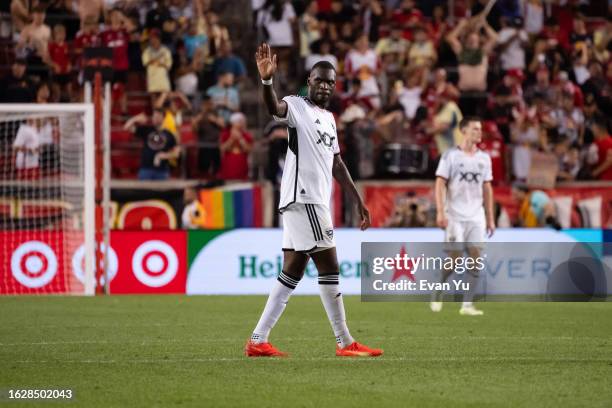 Christian Benteke of D.C. United acknowledges the crowd after the game against the New York Red Bulls at Red Bull Arena on August 20, 2023 in...