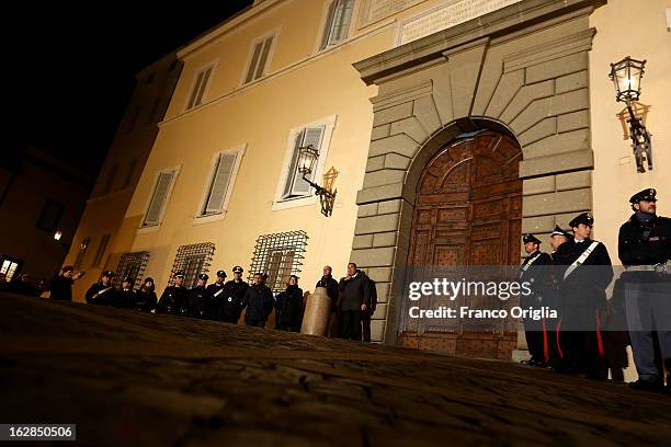 The gate of the Apostolic Palace closes after Pope Benedict XVI greeted the pilgrims, for the last time as head of the Catholic Church, from the...