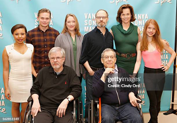 Shalita Grant, Billy Magnussen, Kristine Nielsen, David Hyde Pierce, Sigourney Weaver and Genevive Angelson pose behind playwright Christopher Durang...