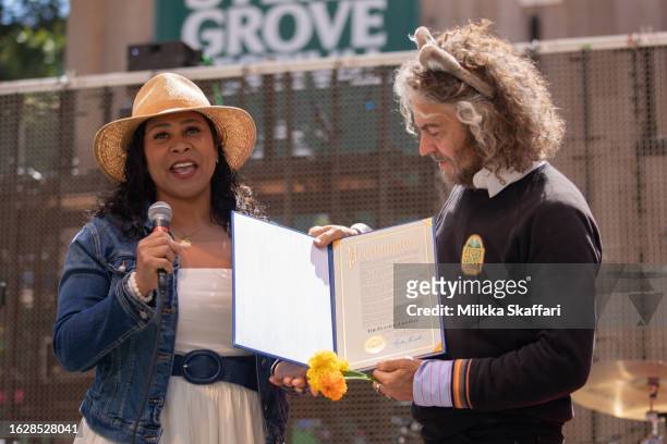 Mayor London Breed proclaims "The Flaming Lips Day" alongside Wayne Coyne of The Flaming Lips at Stern Grove festival on August 20, 2023 in San...