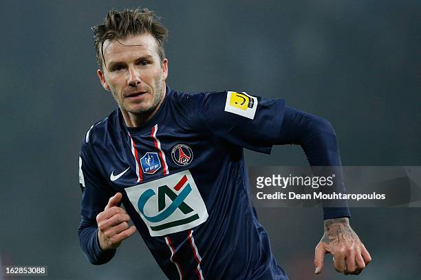 David Beckham of PSG in action during the French Cup match between Paris Saint-Germain FC and Marseille Olympic OM at Parc des Princes on February...